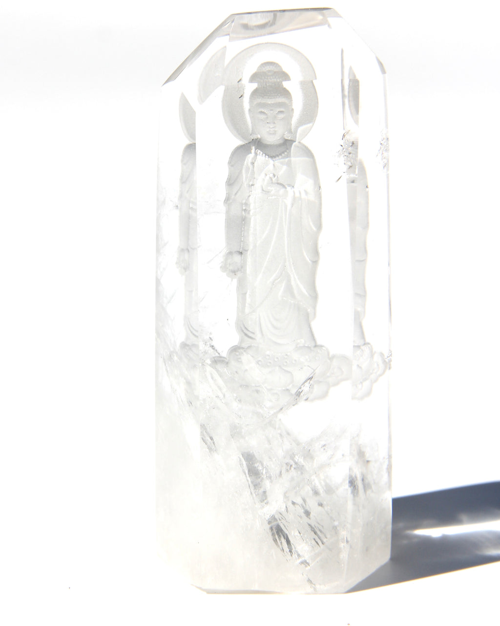 Intaglio carving of the Lord Buddha, with a Lotus on the heart on an Himalayan crystal.  Himalayan crystal are a pure symbol of the Light and many anchor magnificent codes on Gaïa, 